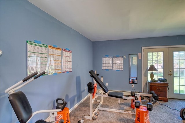 workout room with carpet and french doors