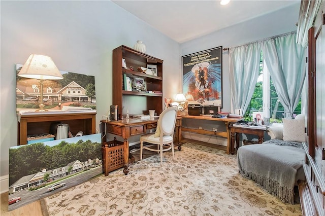 office with light hardwood / wood-style floors