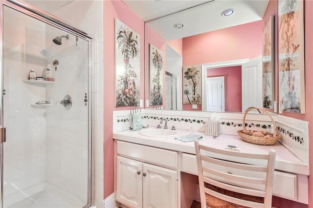 bathroom featuring vanity and walk in shower