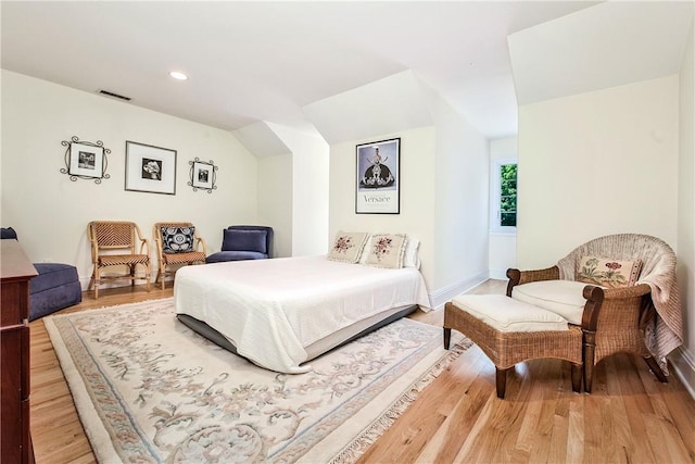 bedroom with light hardwood / wood-style flooring