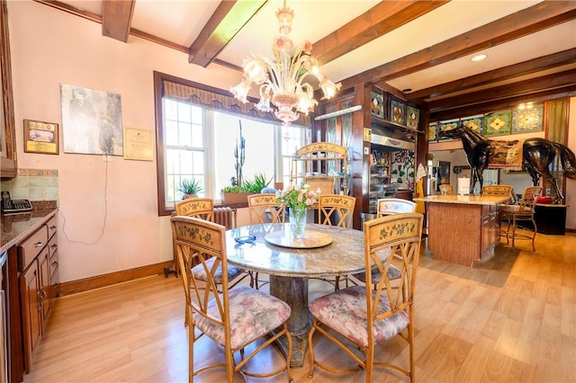 dining area with beamed ceiling, a notable chandelier, and light wood-type flooring