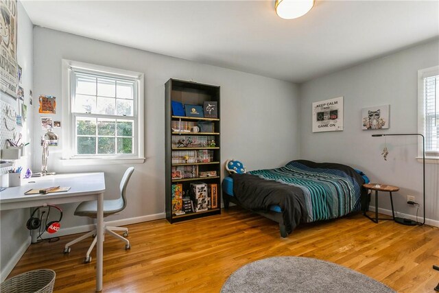 bedroom featuring light wood-type flooring