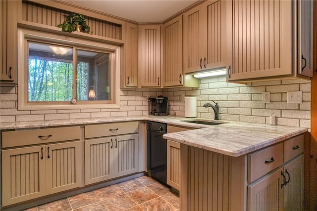 kitchen with dishwasher, decorative backsplash, light stone countertops, and sink