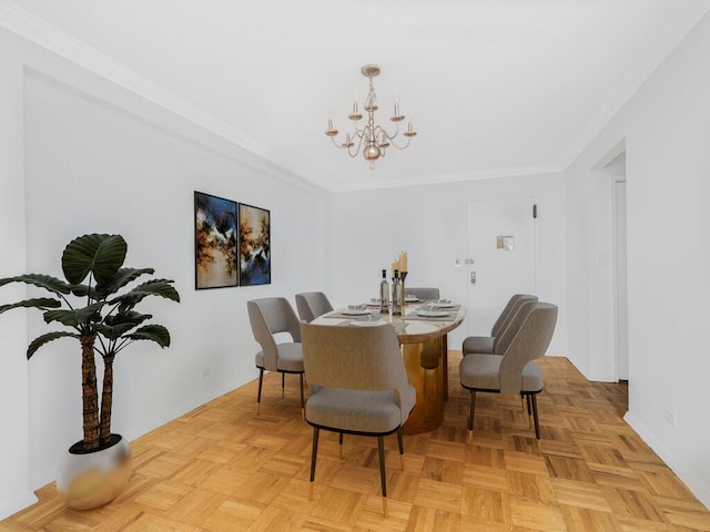 dining area featuring a chandelier, light parquet floors, and ornamental molding