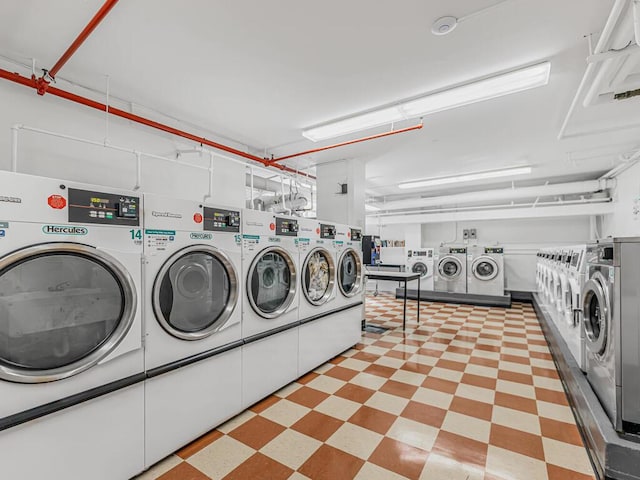 laundry room with washing machine and dryer