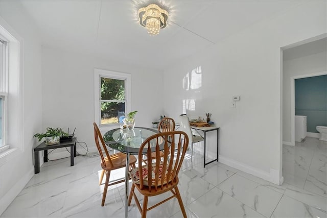 dining room featuring an inviting chandelier