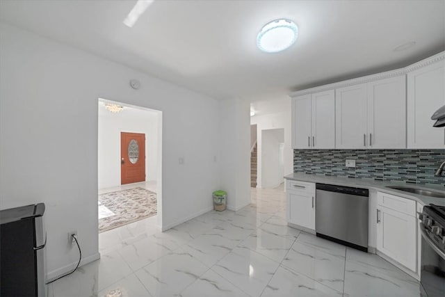 kitchen with dishwasher, decorative backsplash, white cabinetry, and sink