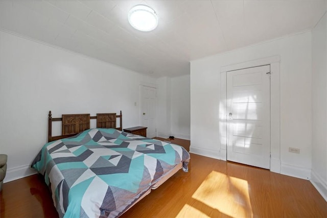 bedroom featuring hardwood / wood-style flooring