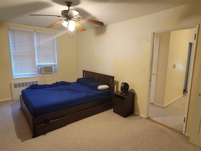 245 Rumsey Rd Unit 7B, Yonkers, NY 10701 - bedroom with radiator, carpet, cooling unit, and ceiling fan