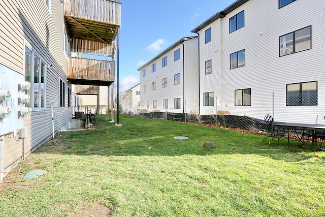 view of yard featuring central air condition unit