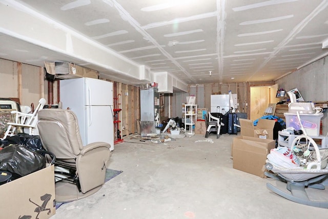 basement with white fridge