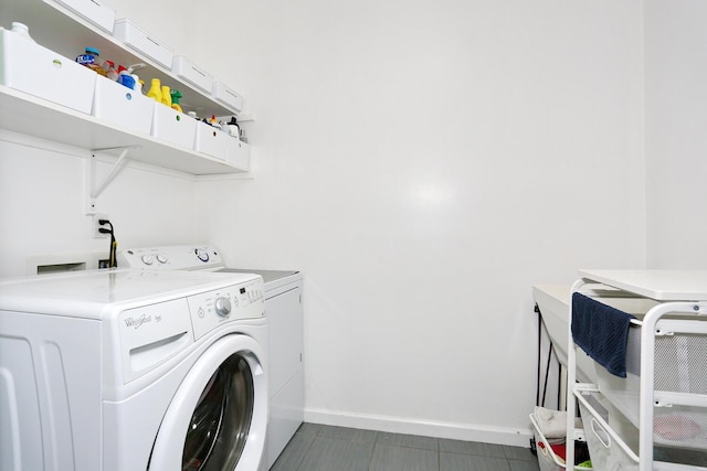 laundry area with washing machine and dryer