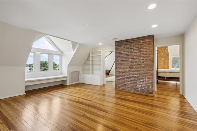 bonus room featuring light hardwood / wood-style floors