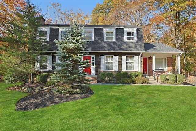 view of front of house featuring a front lawn and a porch