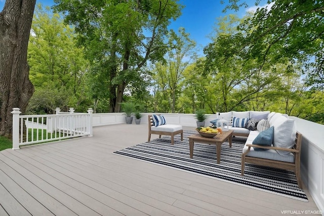 deck featuring outdoor lounge area