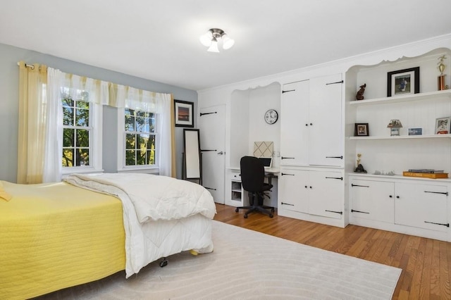 bedroom featuring hardwood / wood-style flooring