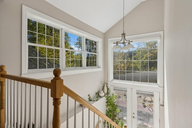 sunroom with a wealth of natural light and vaulted ceiling