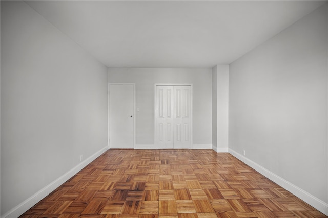 spare room with light parquet flooring