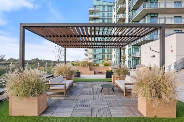 view of patio with a pergola and an outdoor hangout area