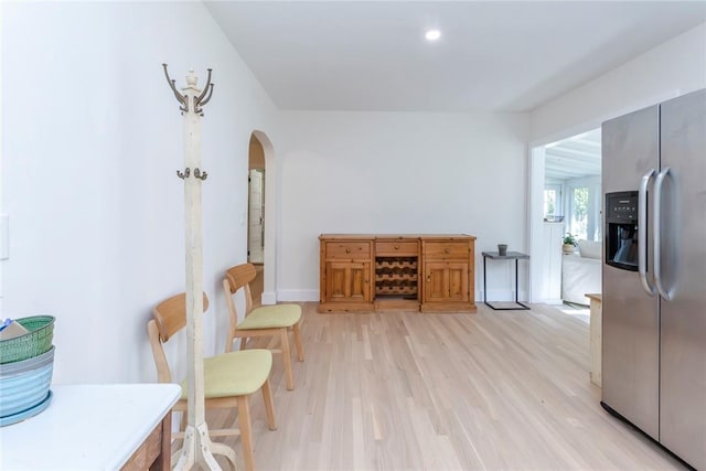 179 Grove St, Tillson, NY 12486 - living area featuring arched walkways, light wood-style floors, baseboards, and recessed lighting
