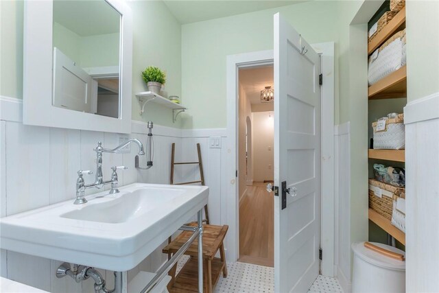 179 Grove St, Tillson, NY 12486 - bathroom with wainscoting, a sink, and tile patterned floors