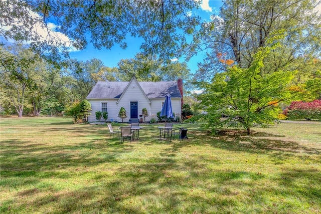 179 Grove St, Tillson, NY 12486 - view of front of home featuring a chimney and a front yard