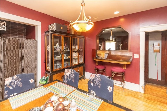 dining area featuring hardwood / wood-style floors