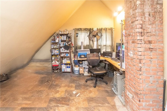 office area featuring vaulted ceiling