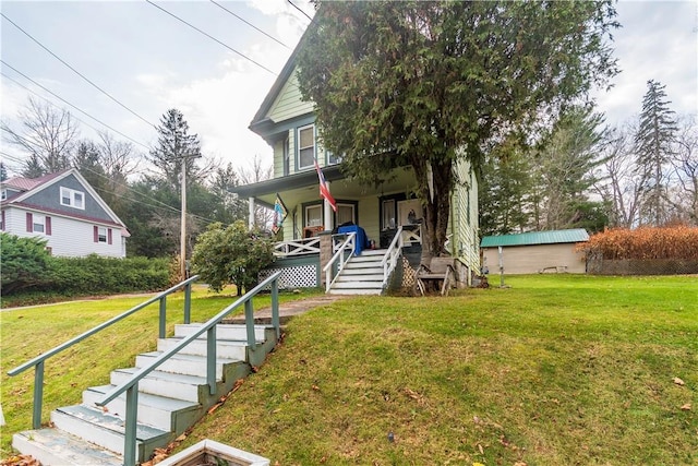 view of front of property featuring a porch and a front yard