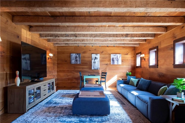 living room with wood walls, beam ceiling, wood ceiling, and dark wood-type flooring