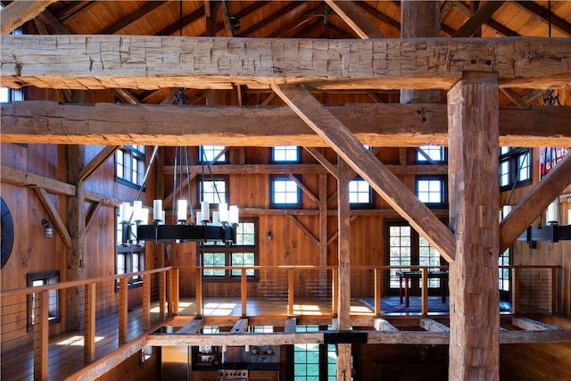 interior space with plenty of natural light and high vaulted ceiling