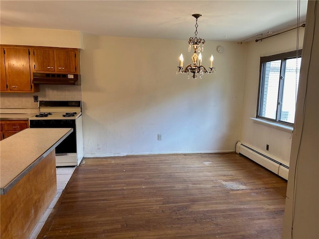 kitchen with hanging light fixtures, a baseboard radiator, white range oven, hardwood / wood-style floors, and a chandelier