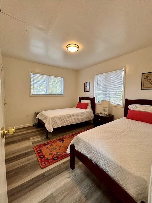 bedroom featuring wood-type flooring