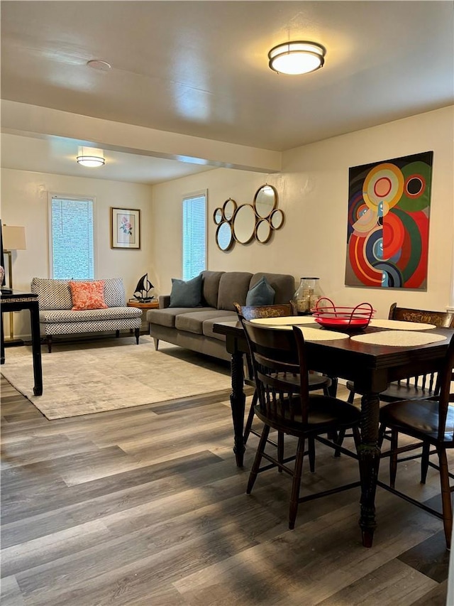 dining room with hardwood / wood-style flooring