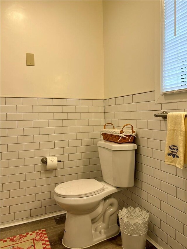 4 Worden Ln, White Sulphur Spring, NY 12787 - bathroom with toilet, tile walls, wood finished floors, and wainscoting