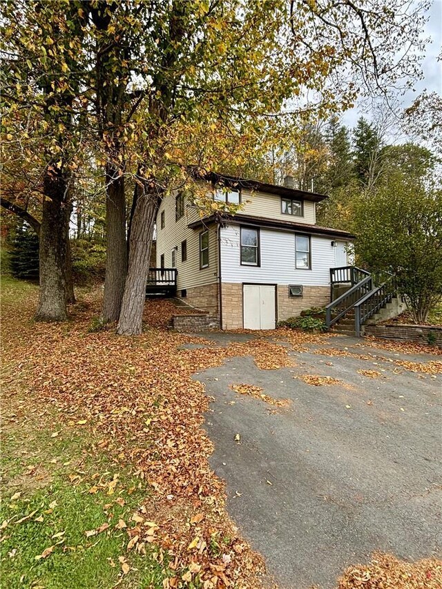 4 Worden Ln, White Sulphur Spring, NY 12787 - view of front of house featuring stairway
