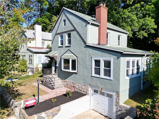 view of front of home featuring a garage