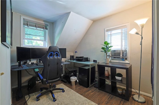 office area featuring lofted ceiling and dark hardwood / wood-style floors