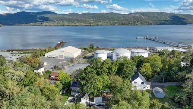 bird's eye view with a water and mountain view