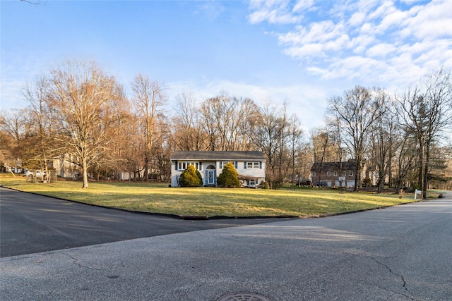 view of front of home with a front lawn