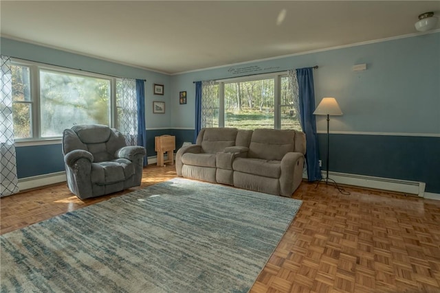 living room with parquet floors, baseboard heating, and crown molding