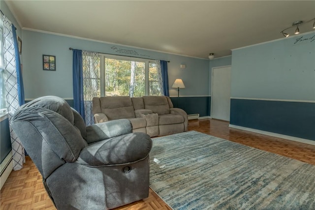 living room with a baseboard heating unit, light parquet floors, and crown molding