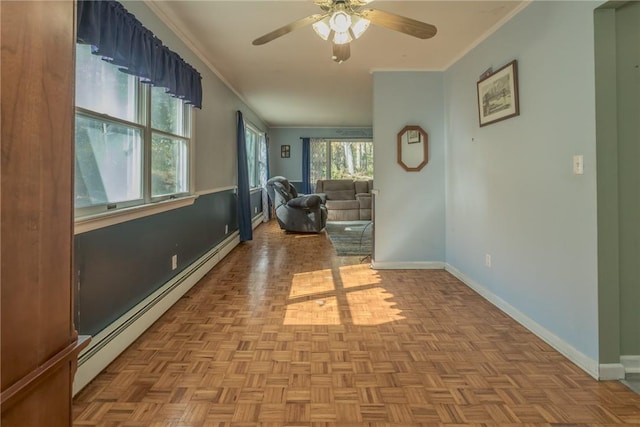 sitting room featuring ceiling fan, light parquet floors, a baseboard radiator, and ornamental molding