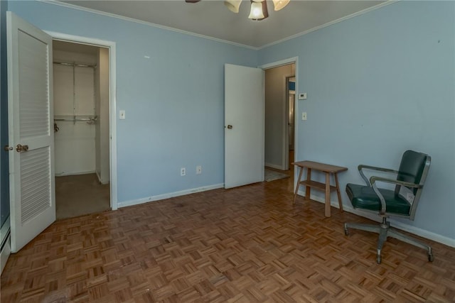 interior space featuring light parquet floors, ceiling fan, and ornamental molding