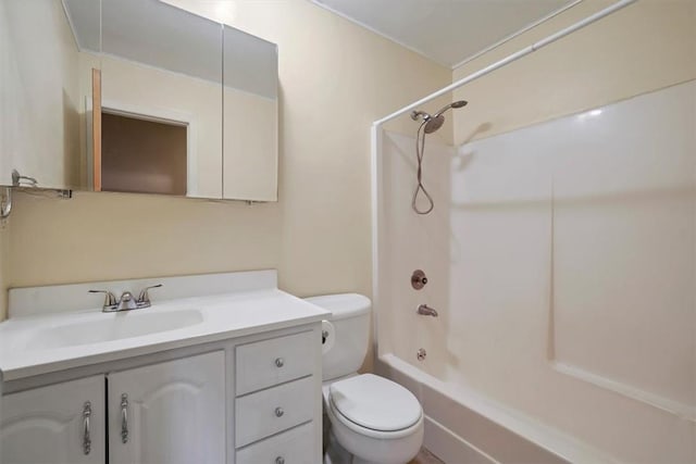 full bathroom with shower / tub combination, vanity, and toilet