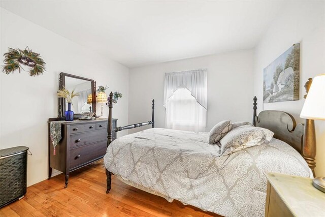 bedroom featuring hardwood / wood-style flooring