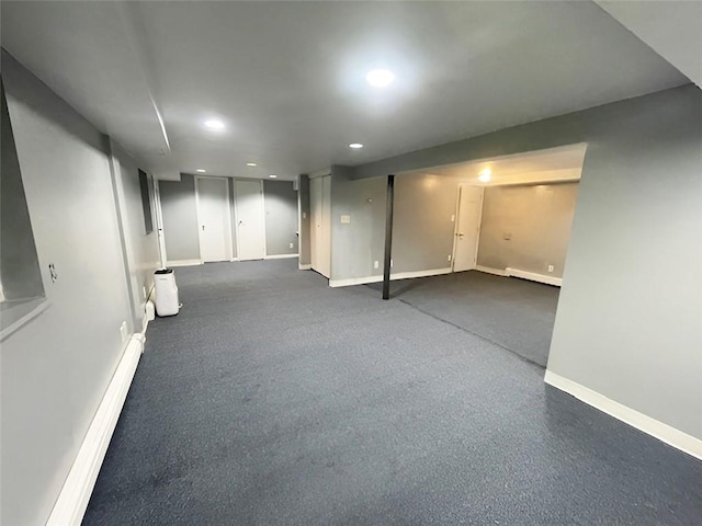 basement with a baseboard heating unit