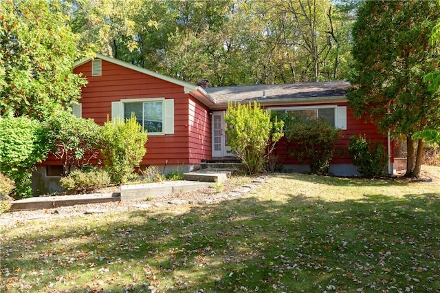 view of front of house with a front lawn