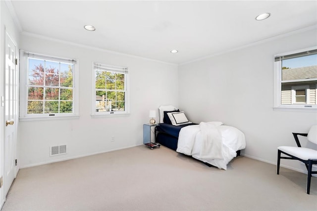 bedroom featuring carpet floors and ornamental molding