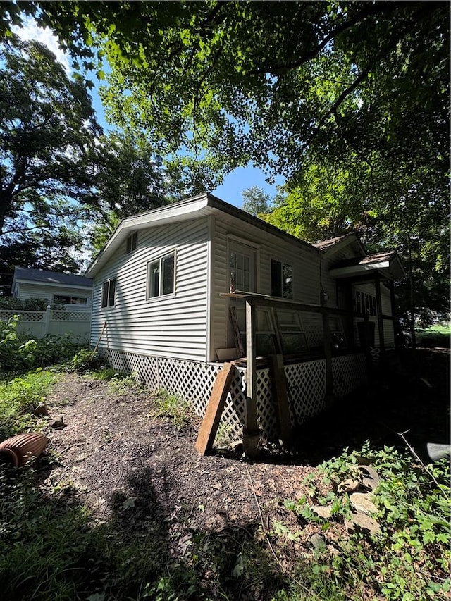 view of property exterior with central AC unit